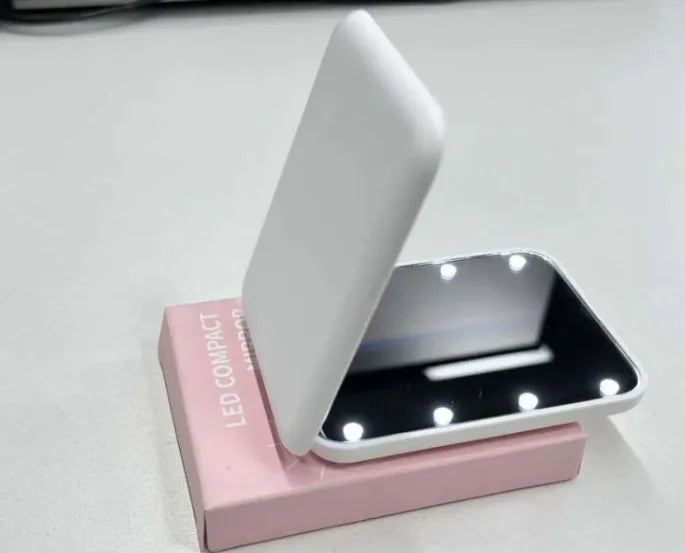 White GlowFold LED makeup mirror with foldable design and bright LED lights